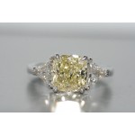 Platinum Fancy Yellow diamond ring.