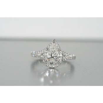 Platinum halo diamond ring with pear shape.